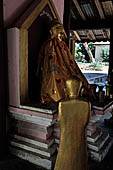 Bagan Myanmar. Shwezigon pagoda. The precinct is full of numerous images, inscribed bells, stone inscriptions and other paraphernalia.  